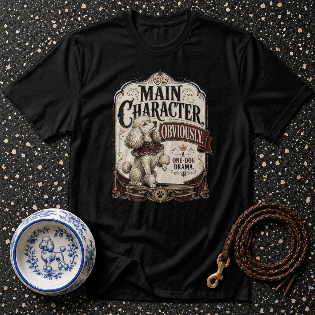 Black t-shirt with poodle graphic reading "Main Character, Obviously - A One-Dog Drama."