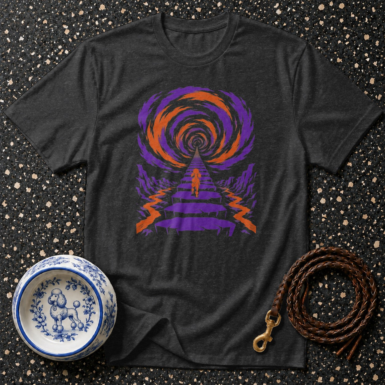 Dark grey t-shirt with psychedelic orange and purple vortex graphic of a figure walking.