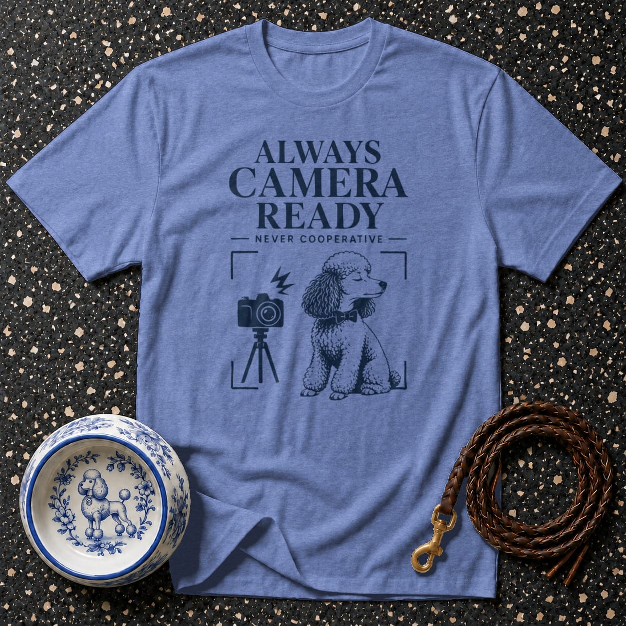 T-shirt with "ALWAYS CAMERA READY NEVER COOPERATIVE" text, poodle, and camera.