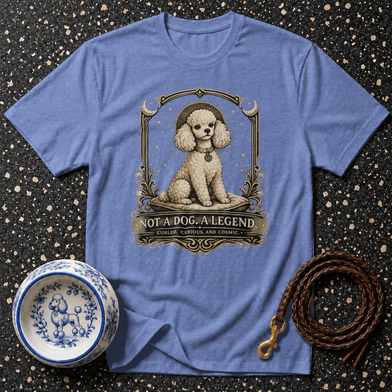 Blue t-shirt with "NOT A DOG. A LEGEND." text and poodle illustration.