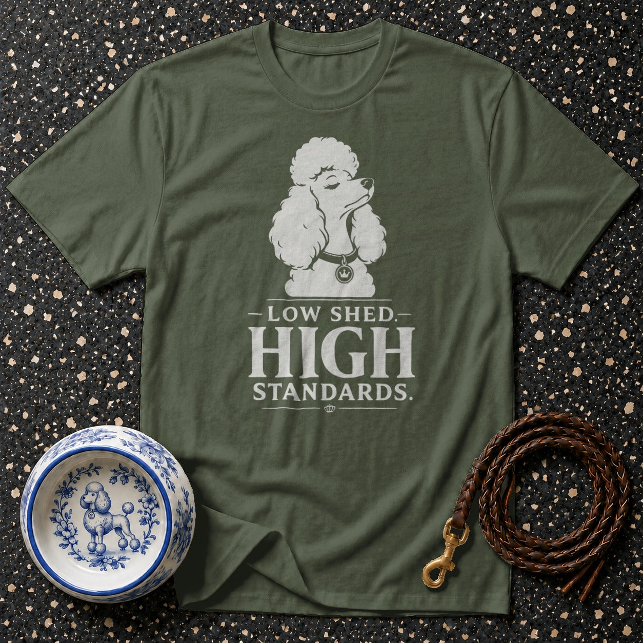 Green t-shirt with white poodle graphic and text "LOW SHED. HIGH STANDARDS."