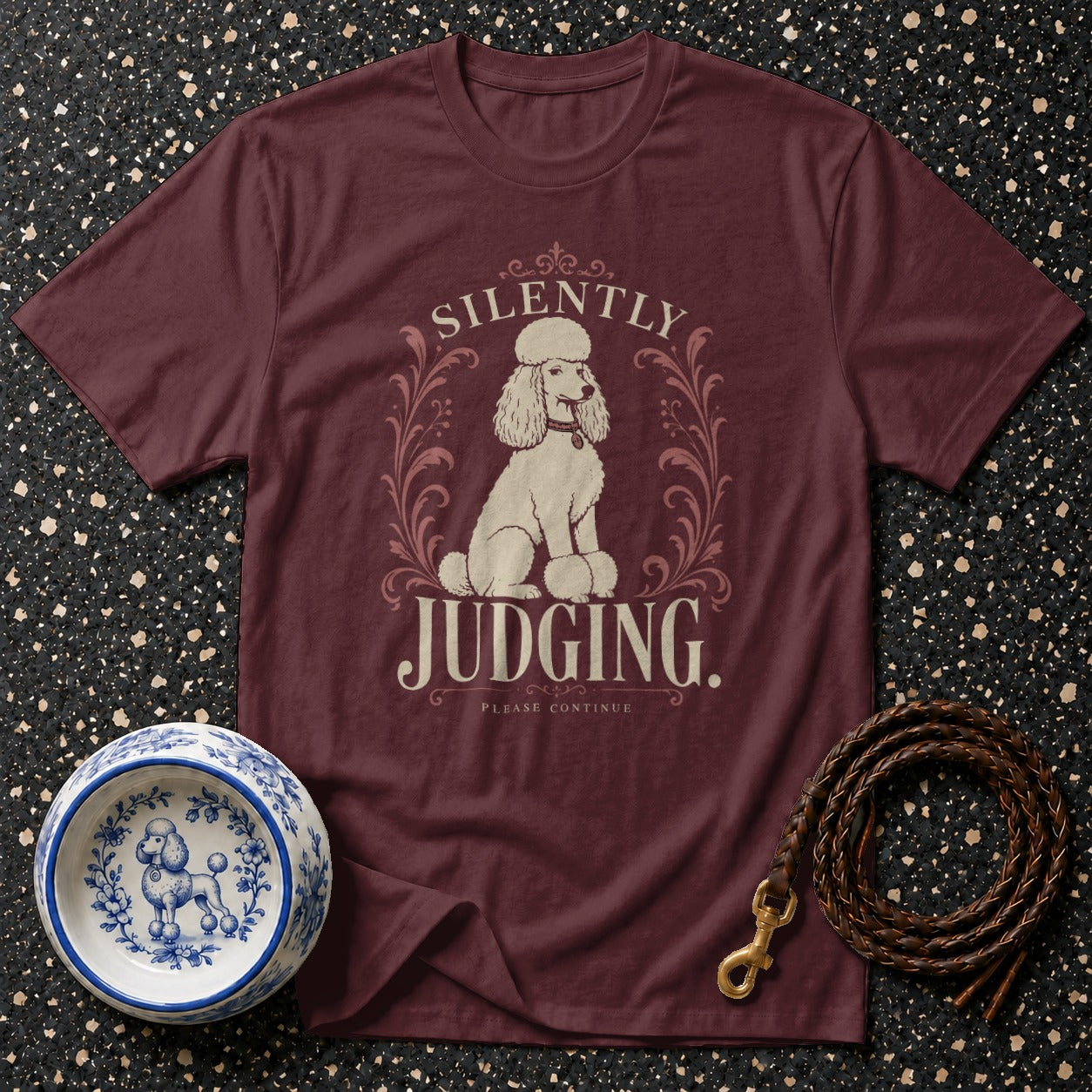 Maroon t-shirt with a poodle graphic and "Silently Judging. Please Continue." text.