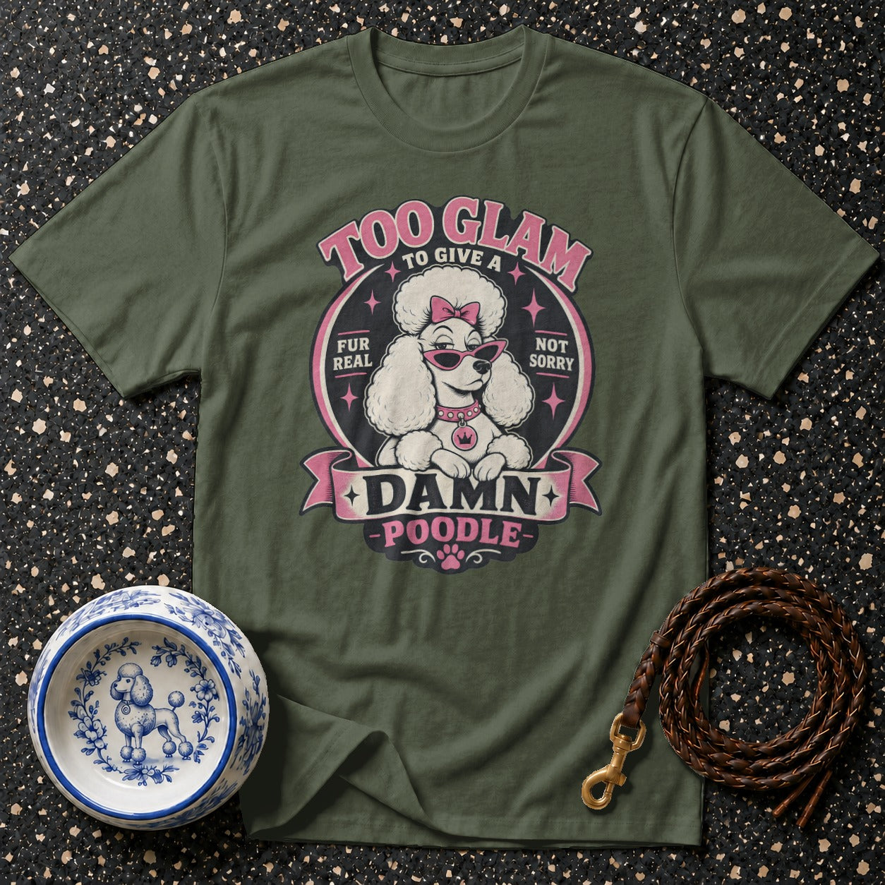 Green t-shirt with a poodle graphic that reads "Too Glam to Give a Damn Poodle."