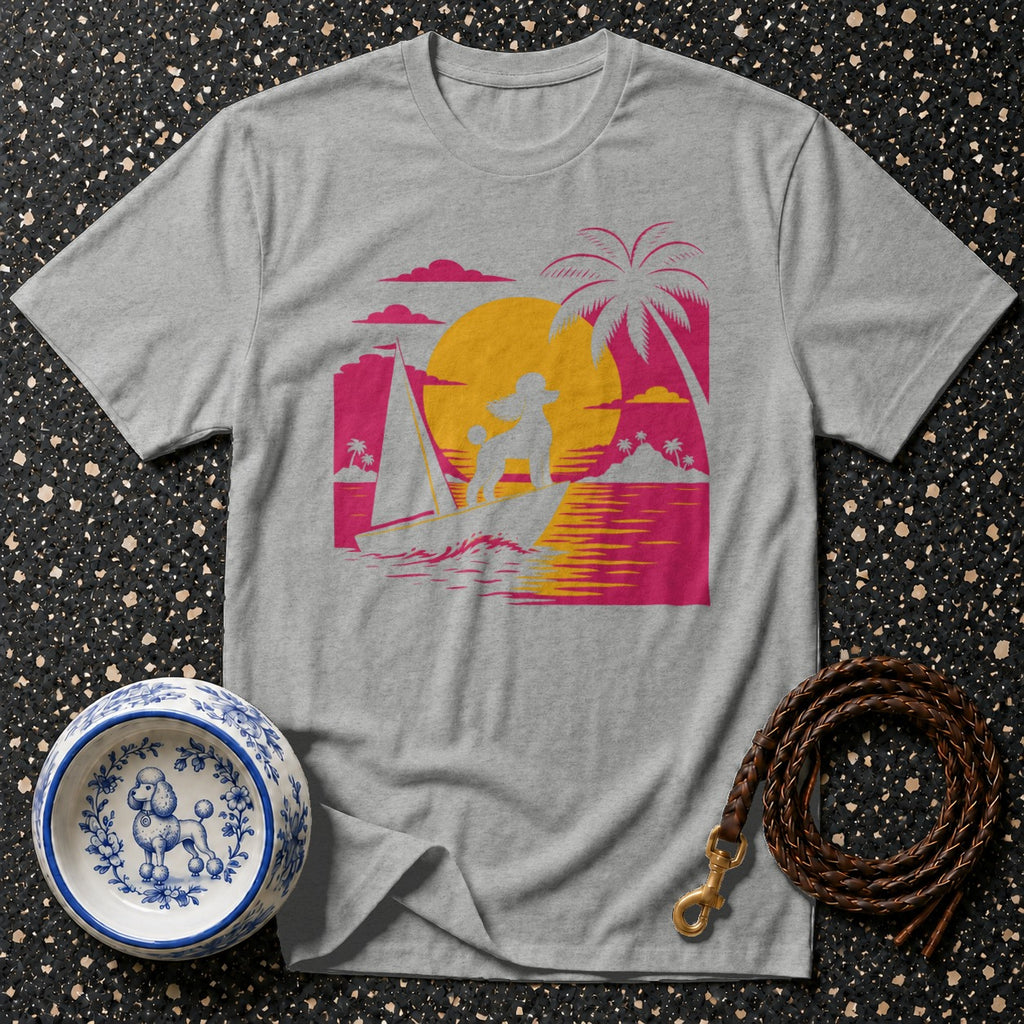 Grey t-shirt with poodle surfing a wave at sunset graphic.