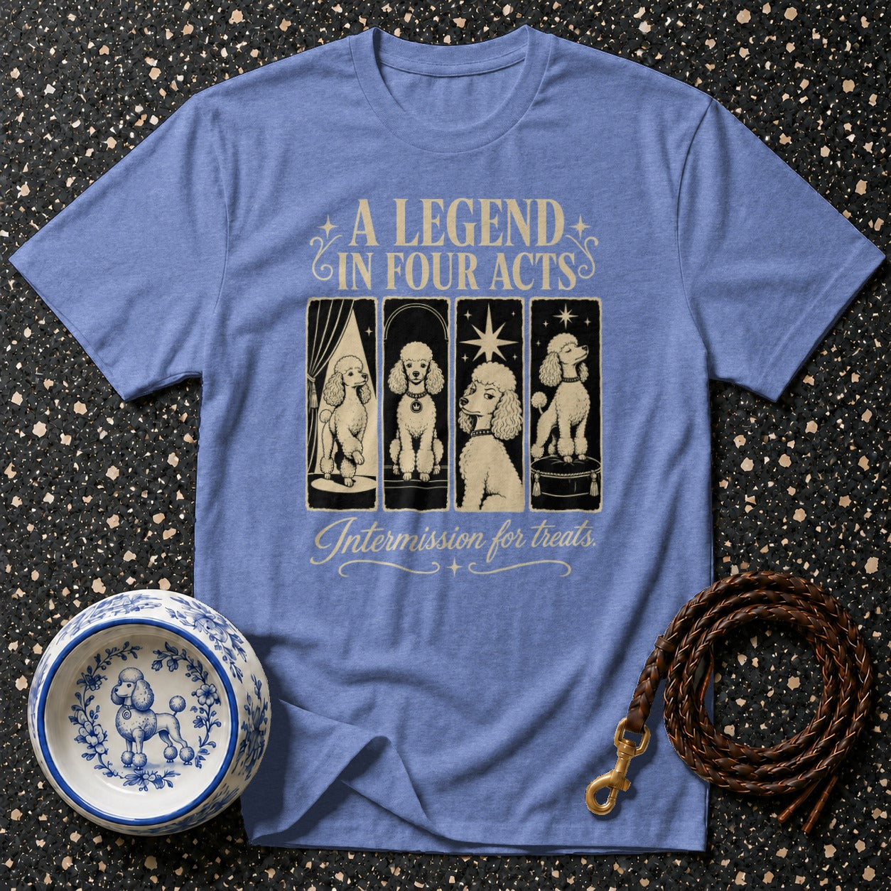 Blue t-shirt with "A Legend in Four Acts" and four poodles.