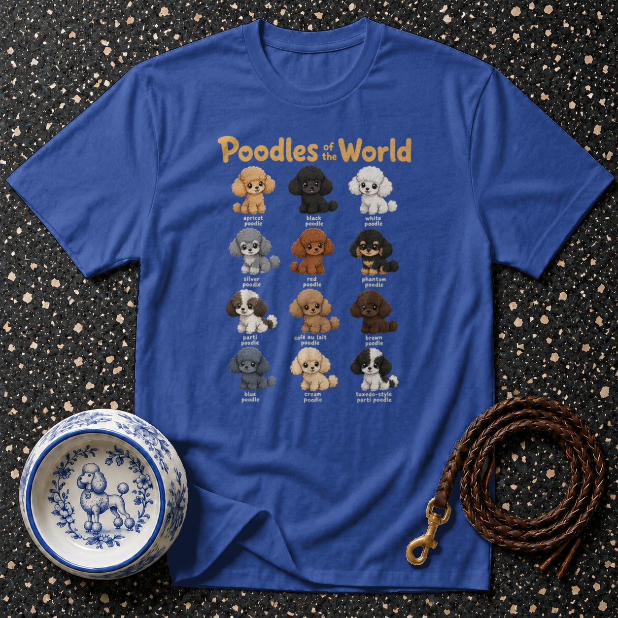 Blue t-shirt featuring "Poodles of the World" with illustrations of poodles in various colors.