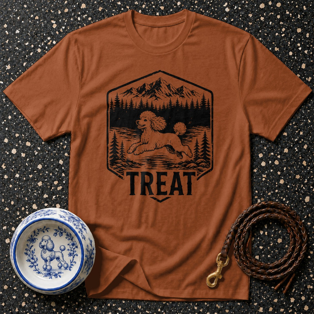 Brown t-shirt with black graphic of a poodle, trees, and mountains, text reads TREAT.
