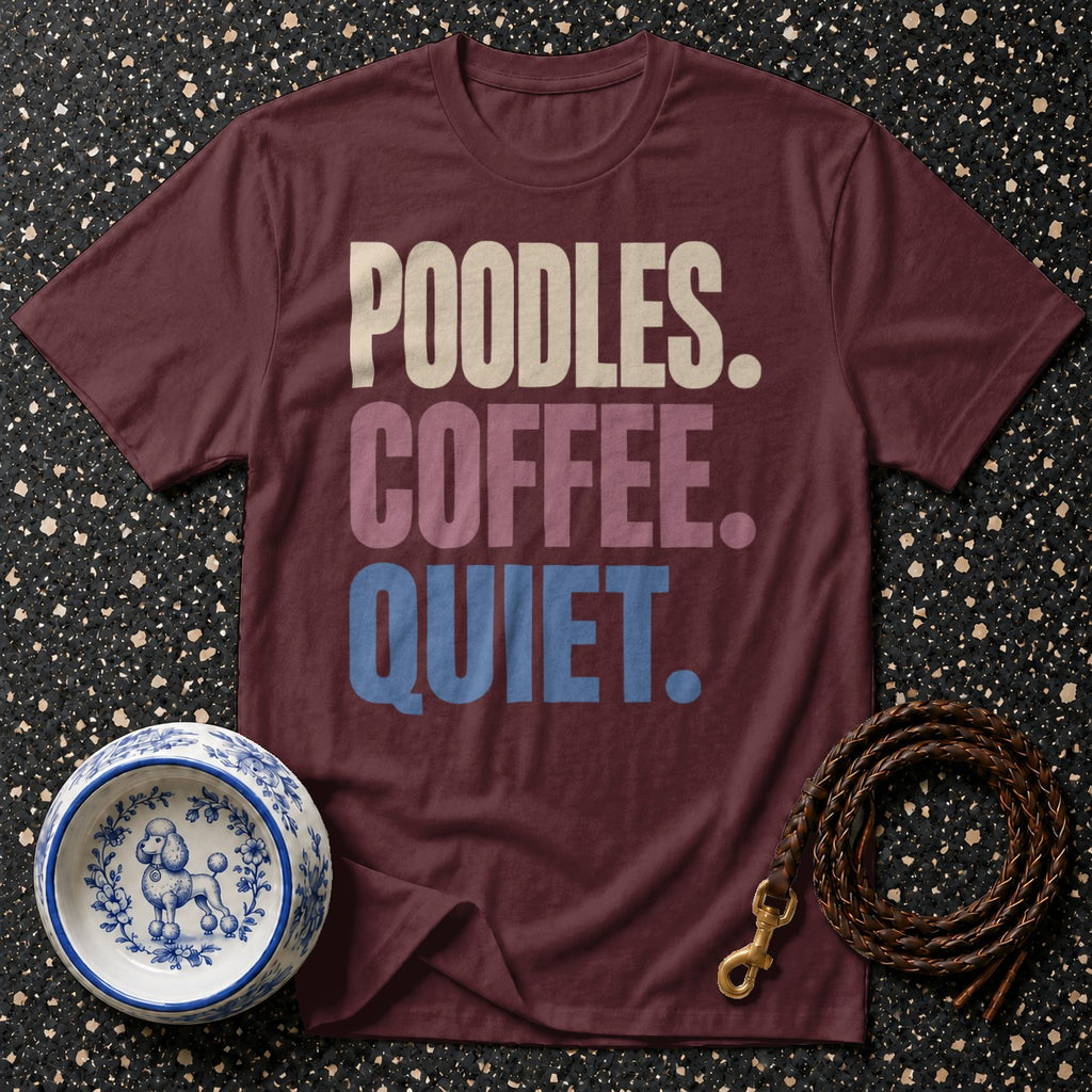 Maroon t-shirt with "Poodles. Coffee. Quiet." text, dog bowl, and leather leash.