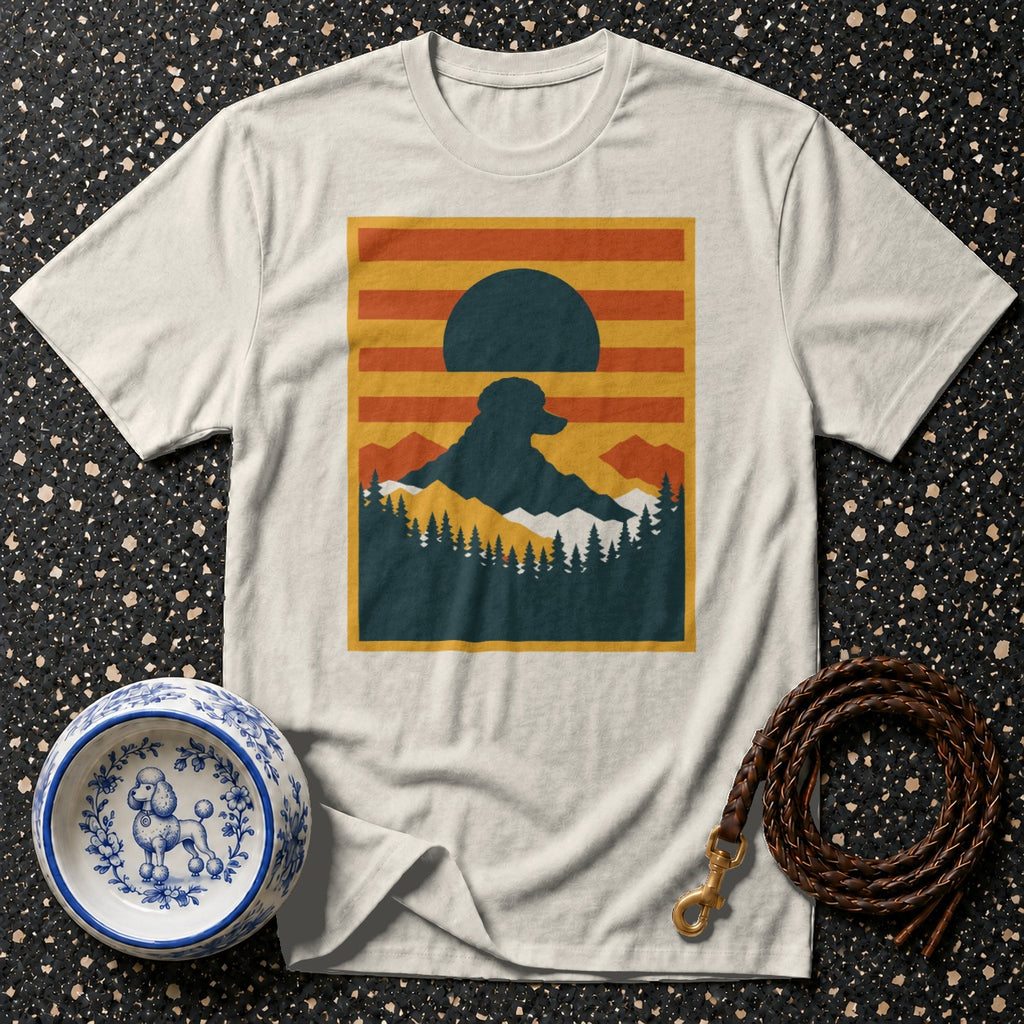 Cream t-shirt with a minimalist mountain landscape graphic featuring a dog silhouette.