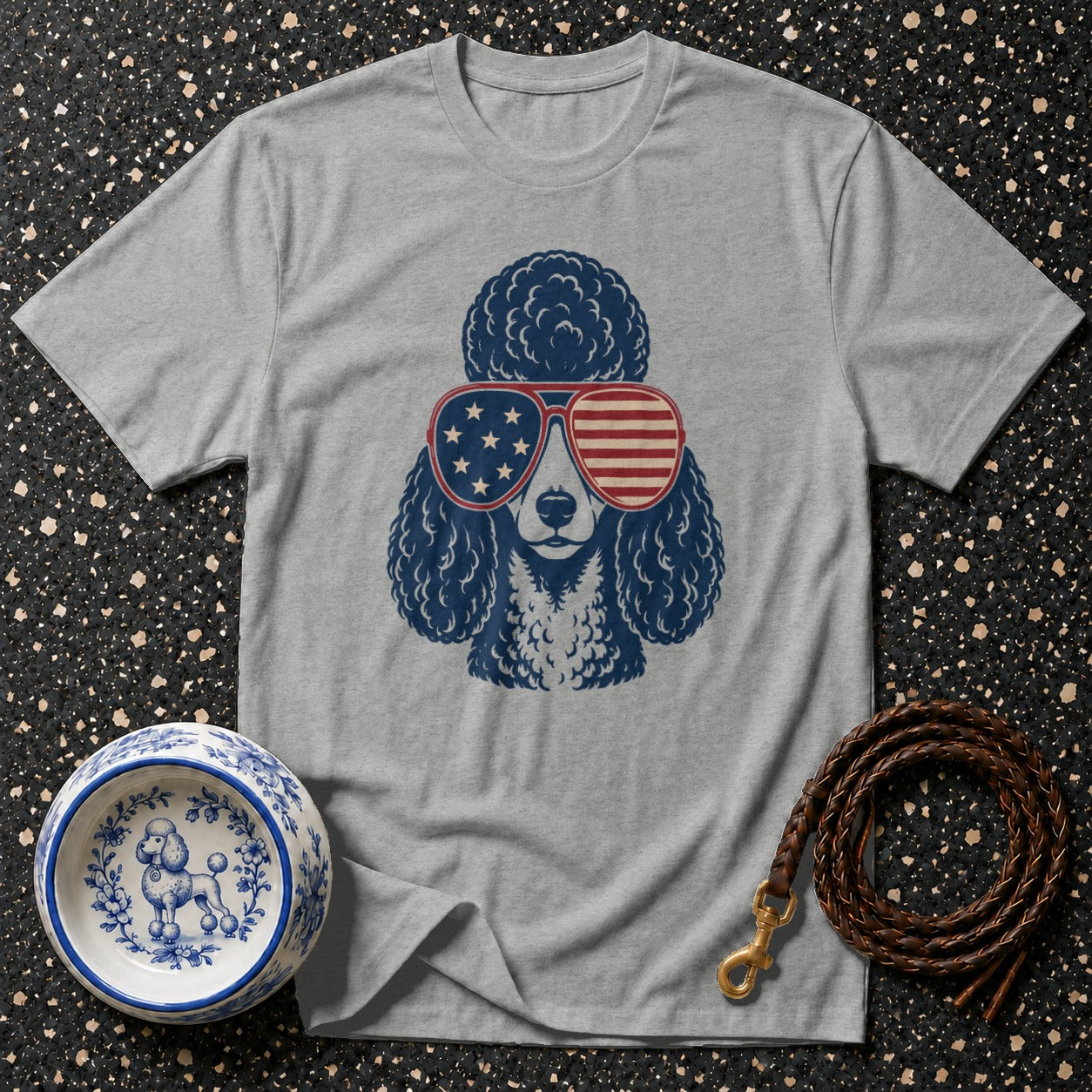 Gray t-shirt with a blue poodle wearing American flag sunglasses.