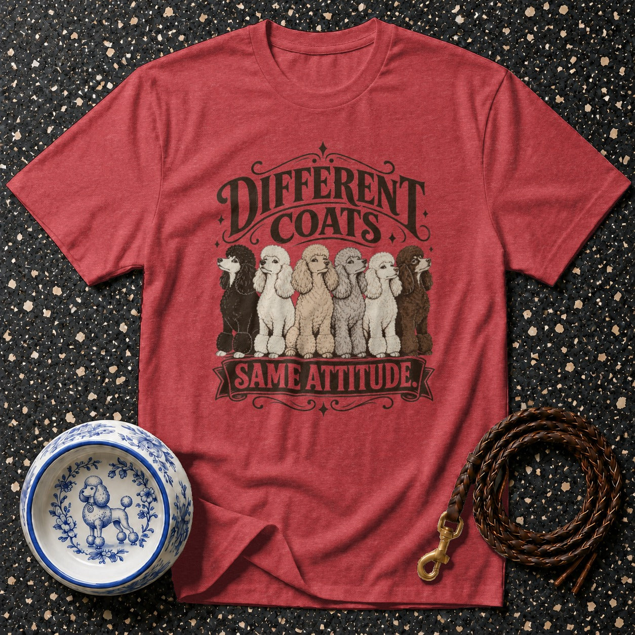 Red t-shirt with "Different Coats Same Attitude" and poodles of various colors.