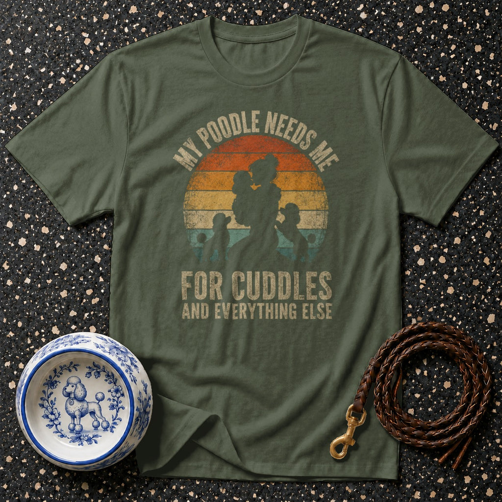 Olive green t-shirt with "My poodle needs me for cuddles and everything else" graphic.