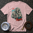 Pink t-shirt with graphic of three poodles and text "The Face Has Range".