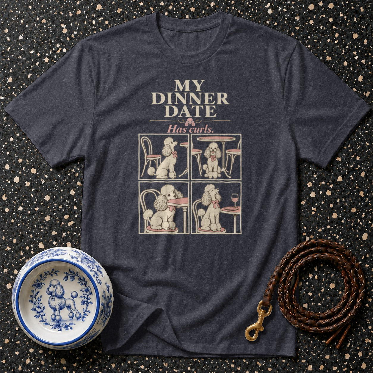 Dark blue t-shirt with a graphic of poodles at dinner and text "MY DINNER DATE Has curls."