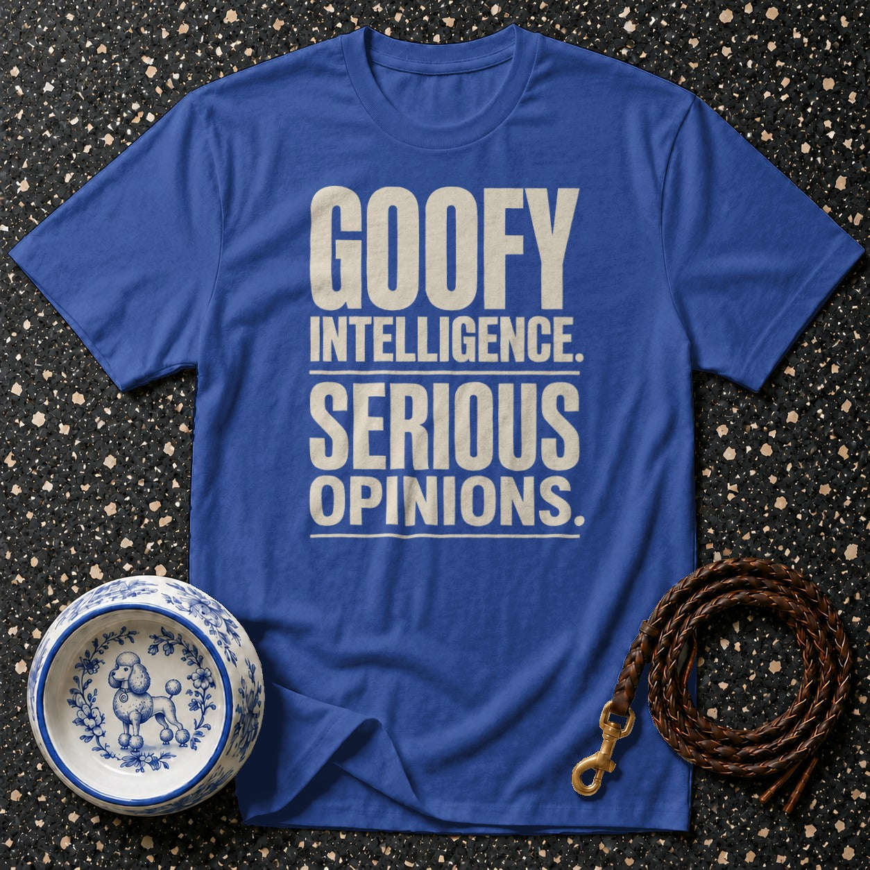 Blue t-shirt with "GOOFY INTELLIGENCE. SERIOUS OPINIONS." text, dog bowl, and leash.