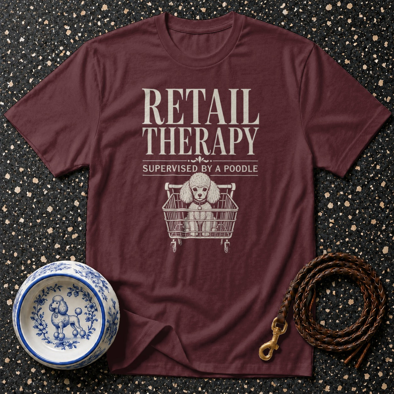 Maroon t-shirt with "Retail Therapy Supervised by a Poodle" text and graphic.
