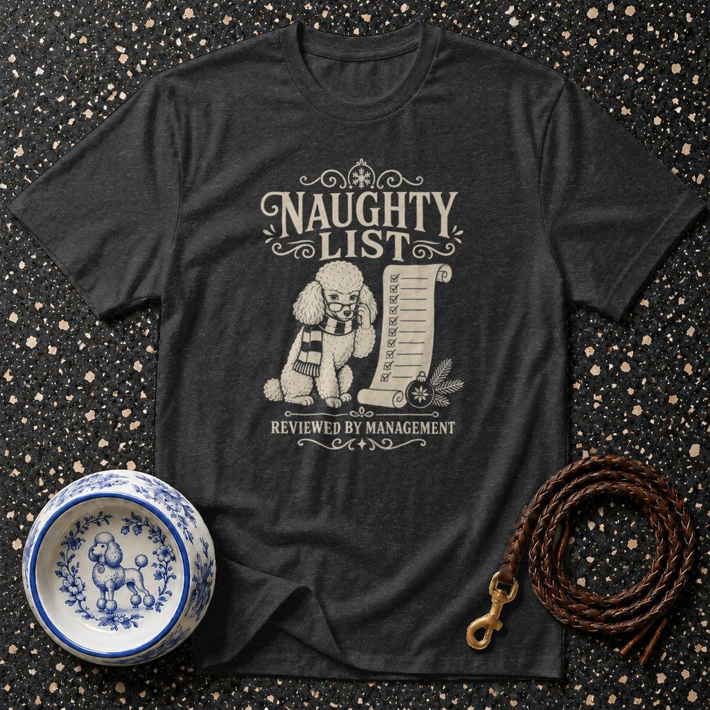 Dark t-shirt with graphic of a poodle, naughty list, and "Reviewed by Management."