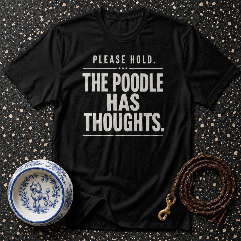 Black t-shirt with "PLEASE HOLD. THE POODLE HAS THOUGHTS." text.