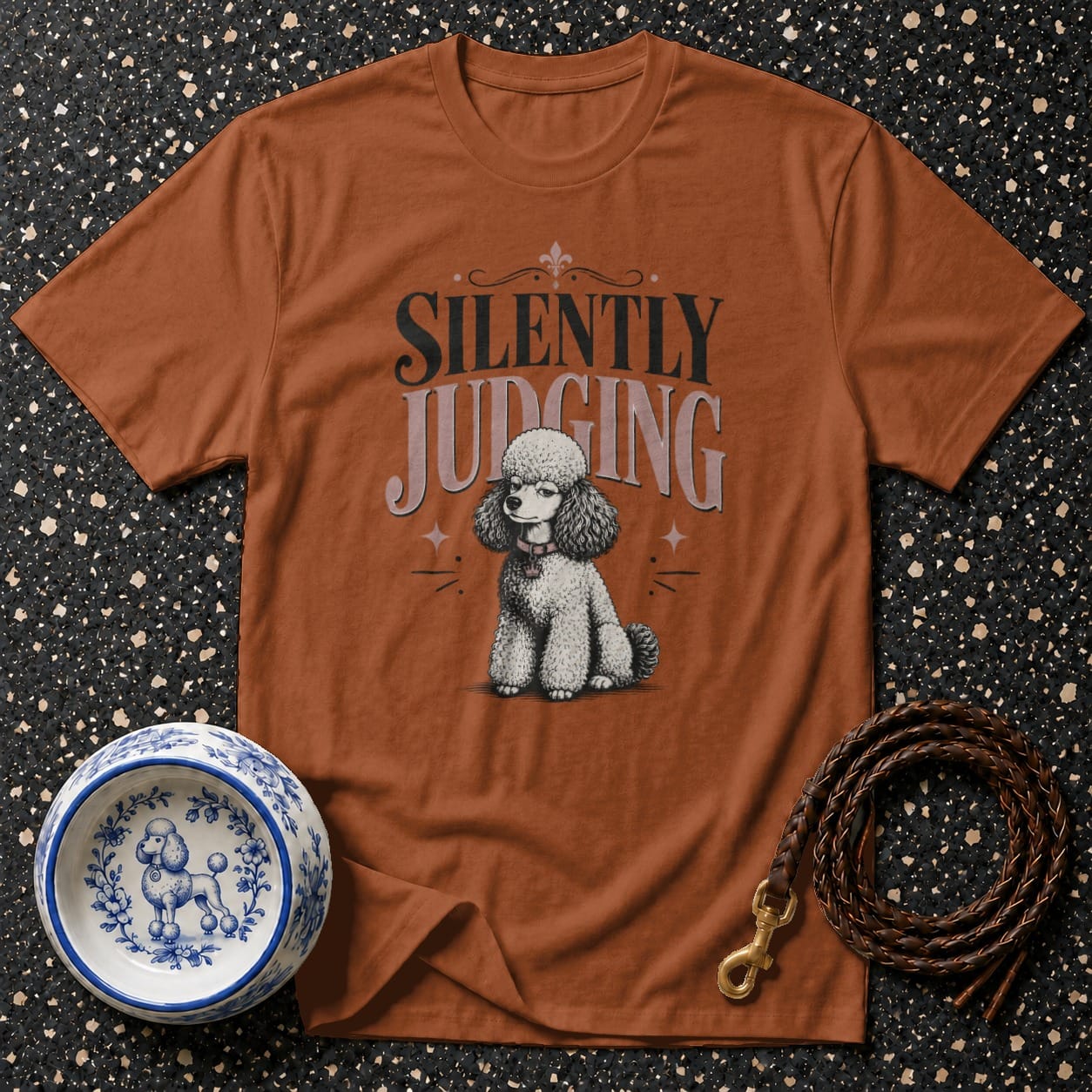 Orange t-shirt with "Silently Judging" text and a poodle graphic.