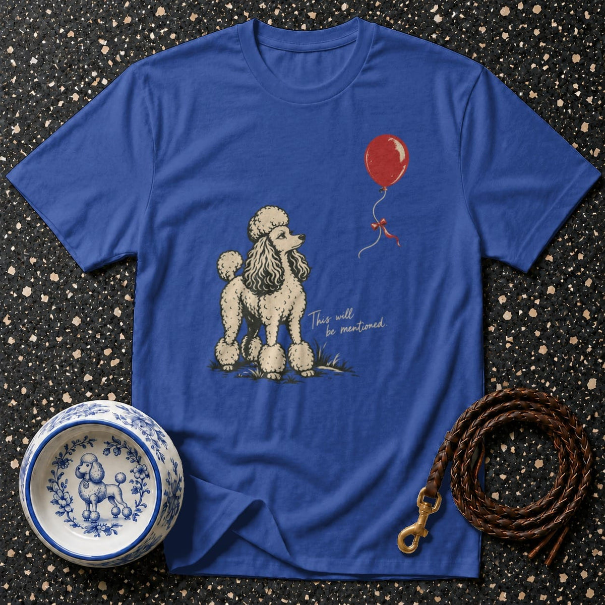 Blue t-shirt with a poodle, balloon, and text "This will be mentioned".