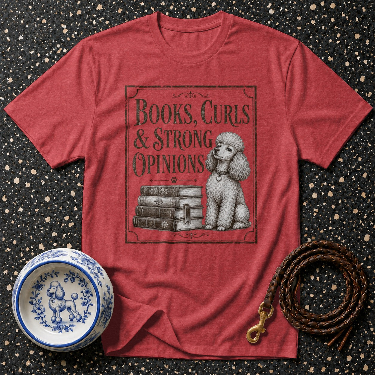 Red t-shirt with poodle, books, and text "Books, Curls & Strong Opinions."