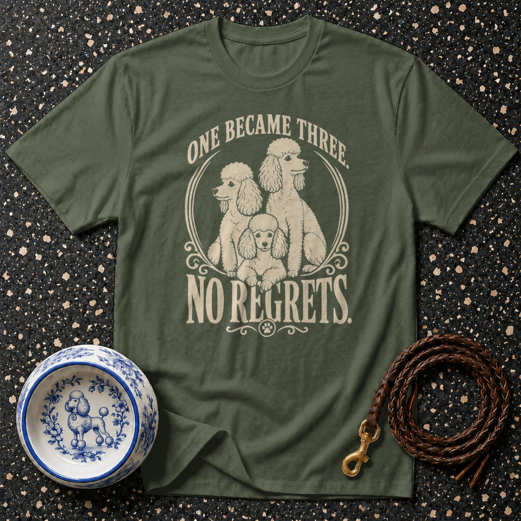 Green t-shirt with poodles and "ONE BECAME THREE. NO REGRETS." text.
