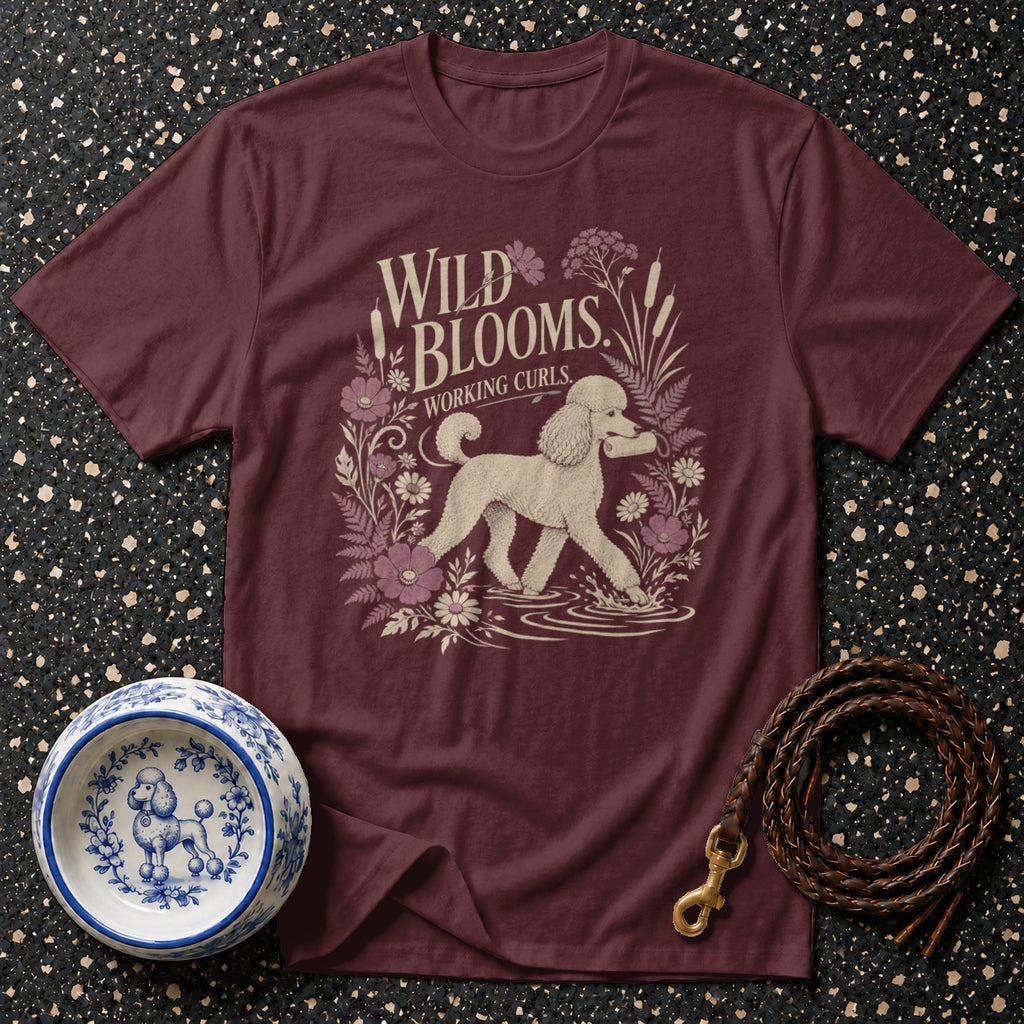Maroon t-shirt with "WILD BLOOMS WORKING CURLS" and poodle graphic.