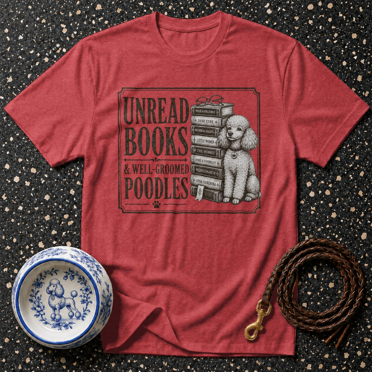 Red t-shirt with "Unread Books & Well-Groomed Poodles" graphic and poodle illustration.