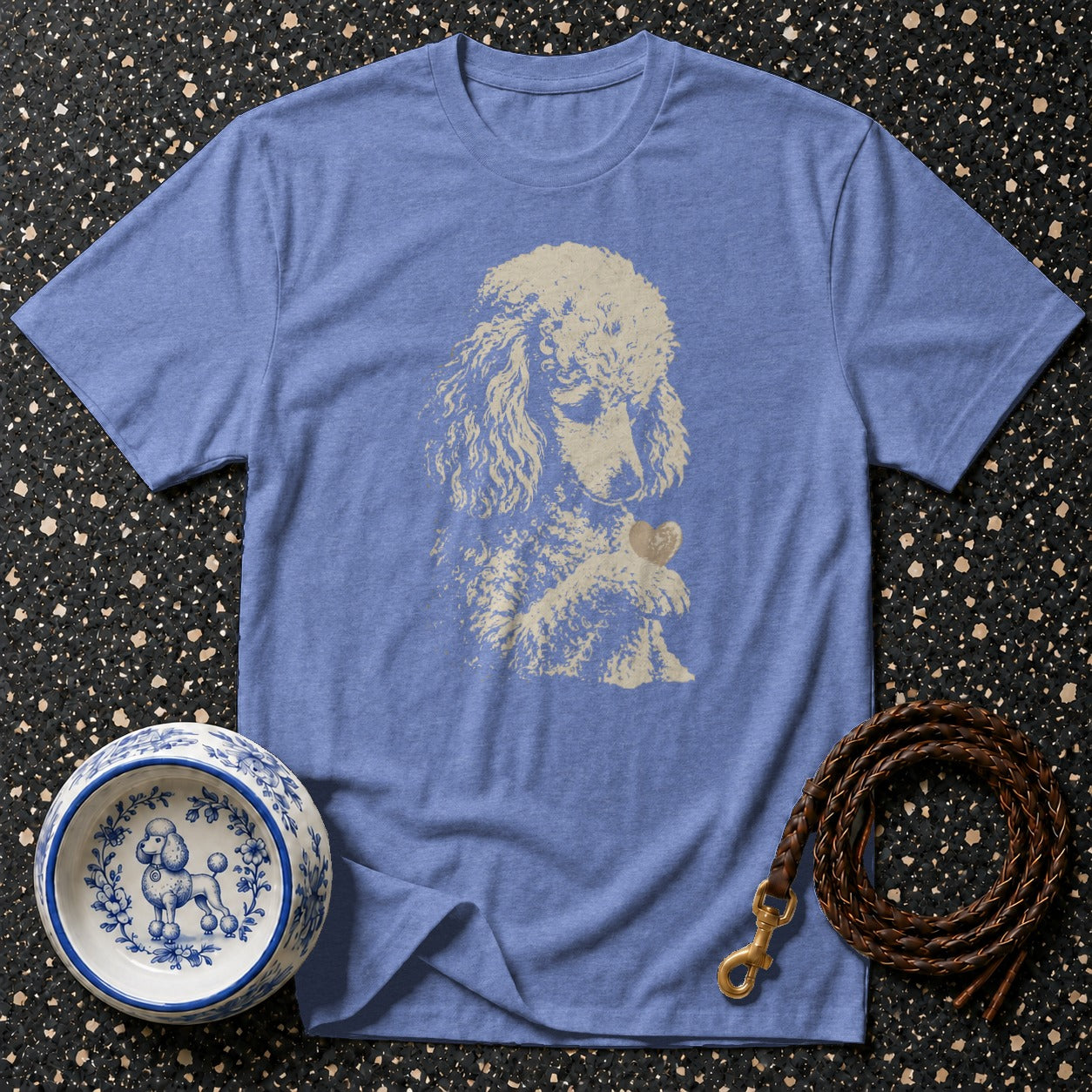 Blue t-shirt with a cream poodle graphic holding a heart, dog bowl and leash.