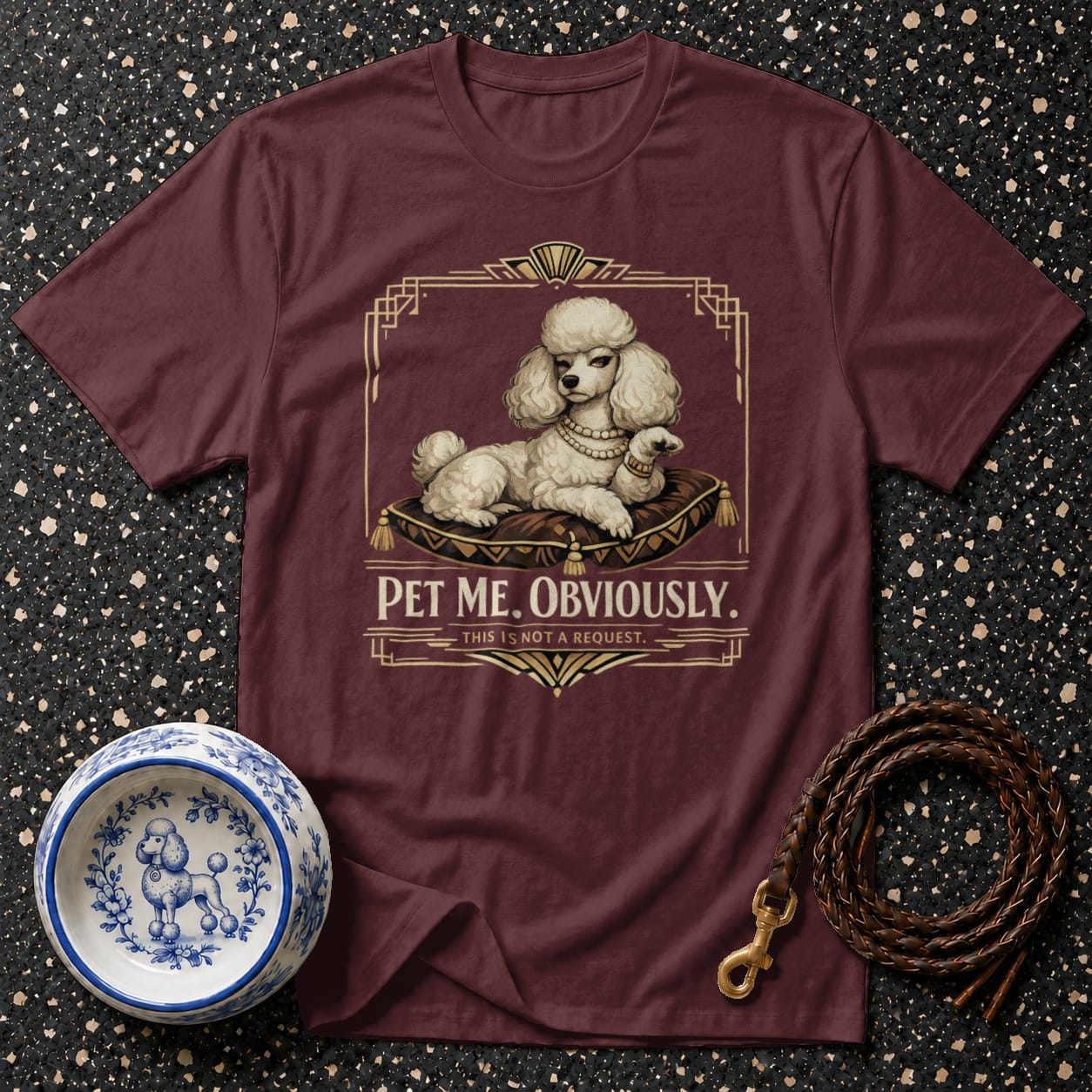 Maroon t-shirt with a white poodle graphic and the text "PET ME. OBVIOUSLY."