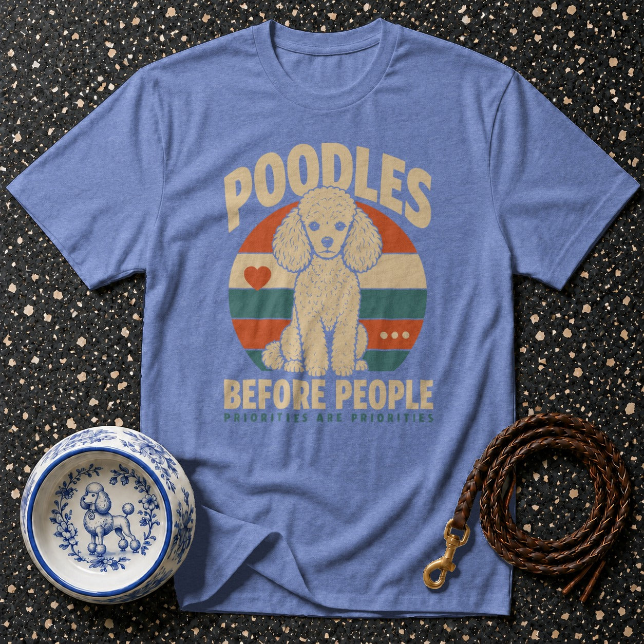 Blue t-shirt with a poodle graphic and text "Poodles Before People".