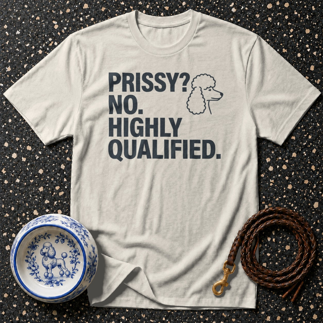 T-shirt with "PRISSY? NO. HIGHLY QUALIFIED." text and poodle graphic.