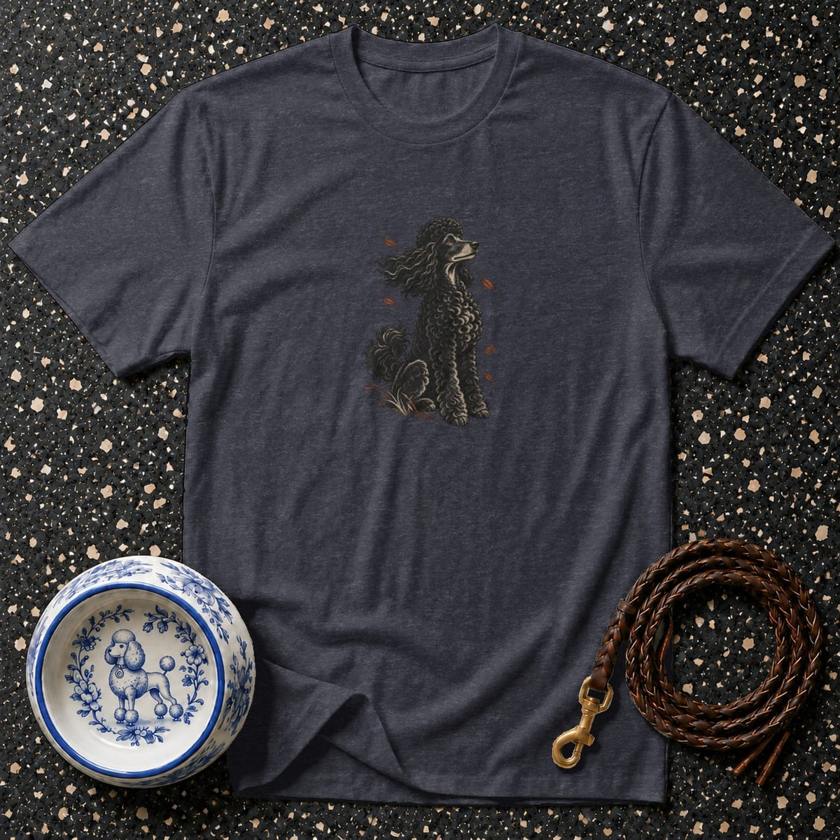 Dark grey t-shirt with black poodle graphic, decorative dog bowl, and leather leash.