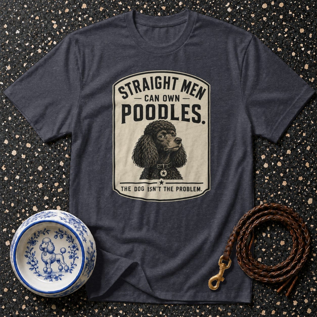 Dark grey t-shirt with vintage poodle graphic and text: "Straight men can own poodles. The dog isn't the problem."