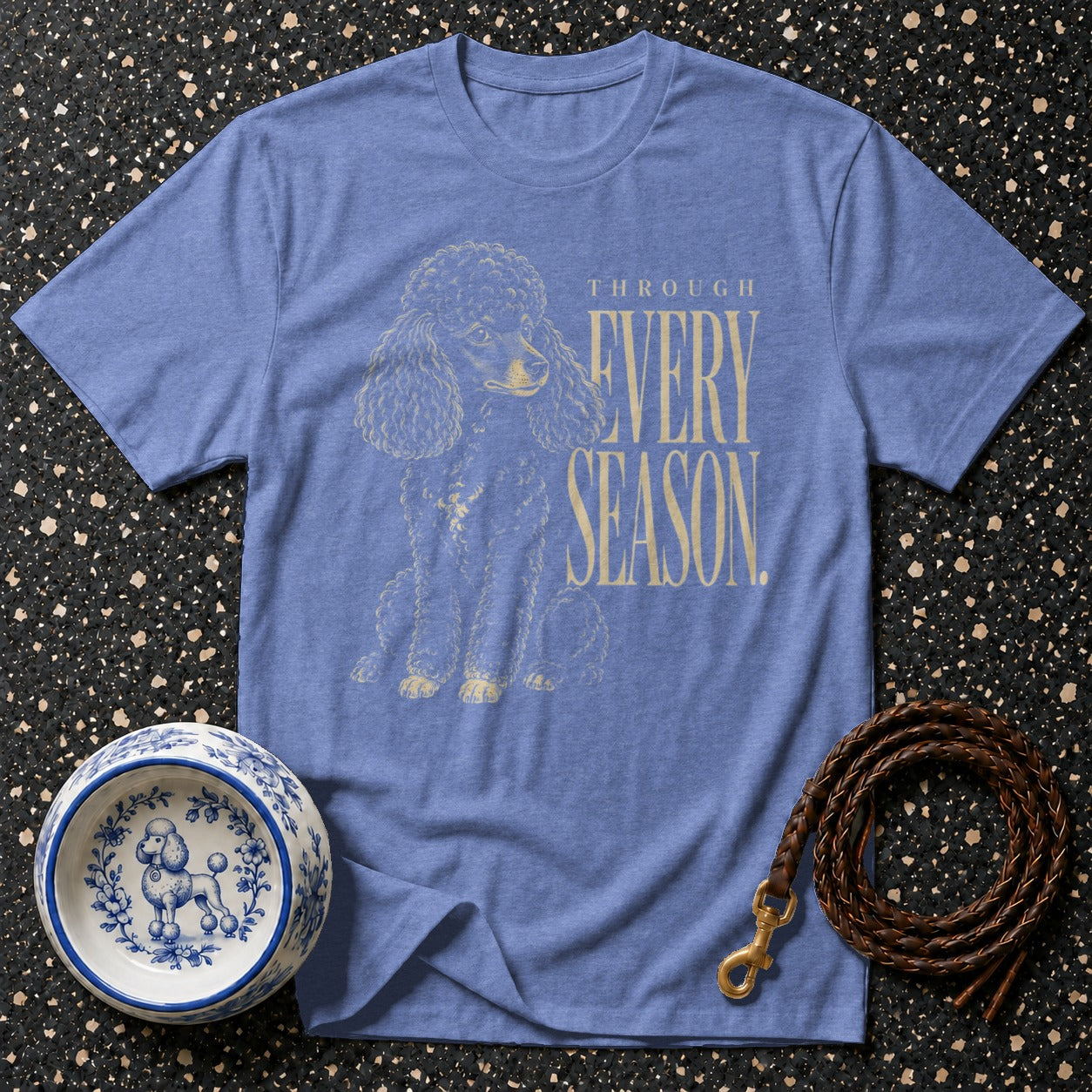 Blue t-shirt with poodle graphic and "THROUGH EVERY SEASON" text.