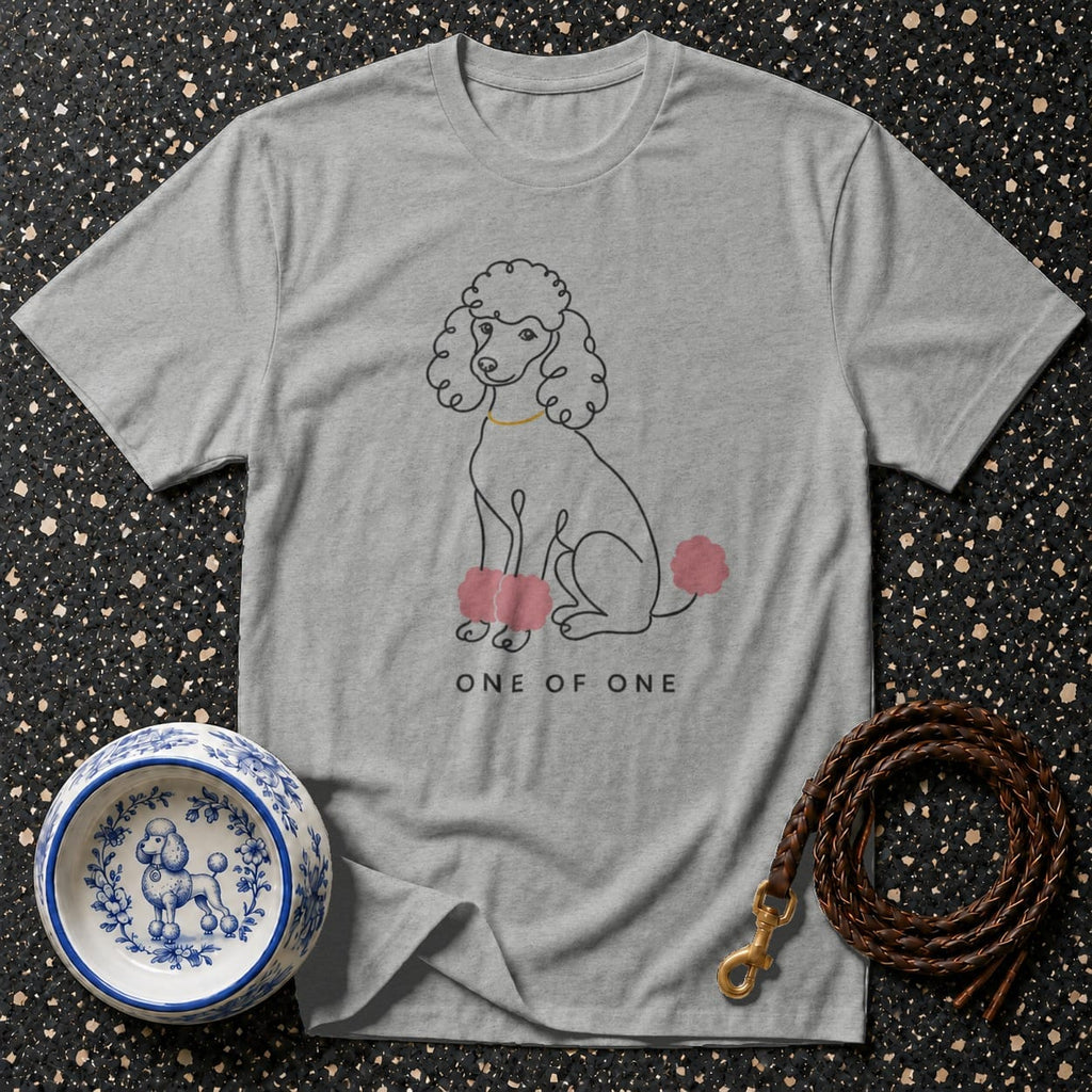 Gray t-shirt with a line drawing of a poodle and text "ONE OF ONE".