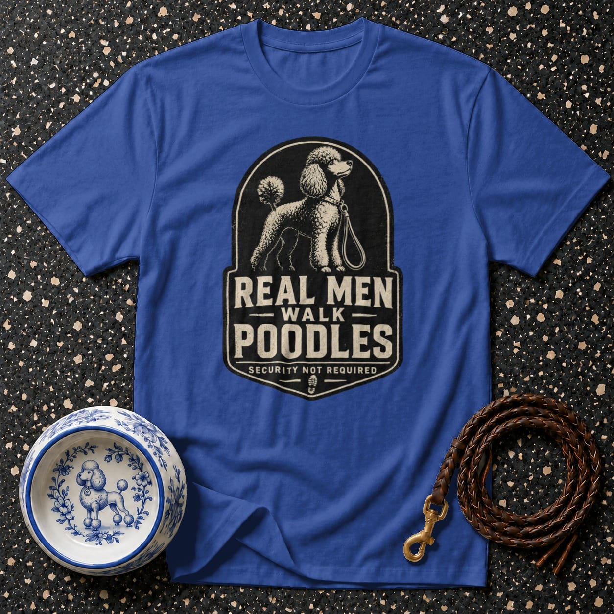 Blue t-shirt with "Real Men Walk Poodles" graphic featuring a poodle illustration.