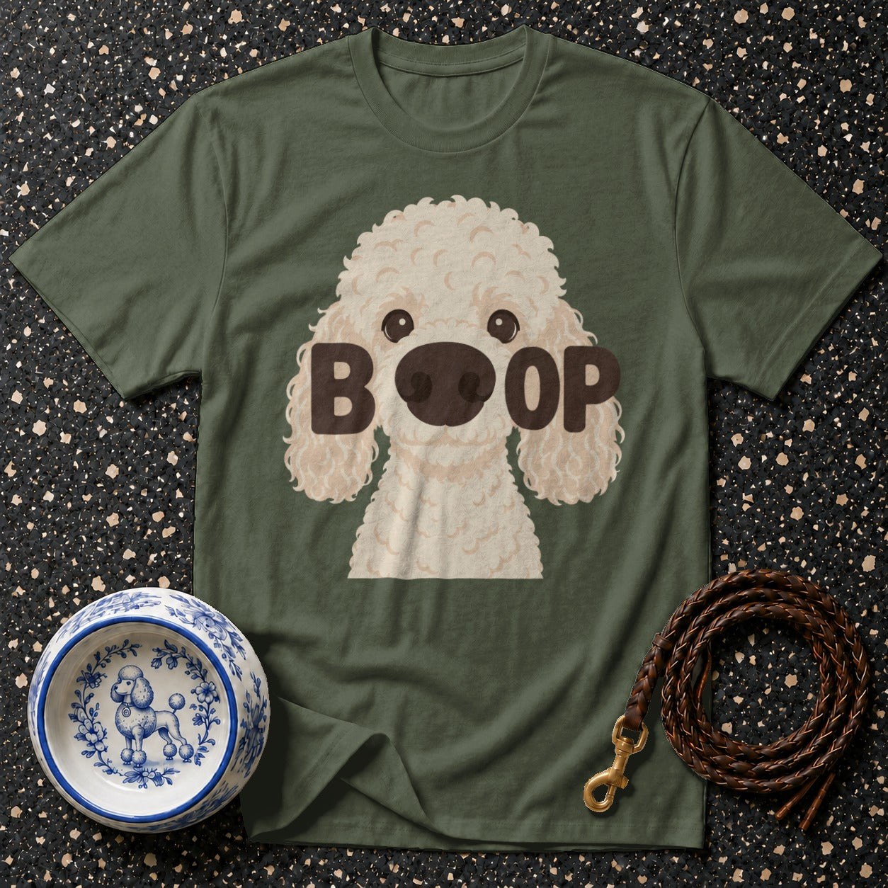 Green t-shirt with "BOOP" text and cream poodle graphic.