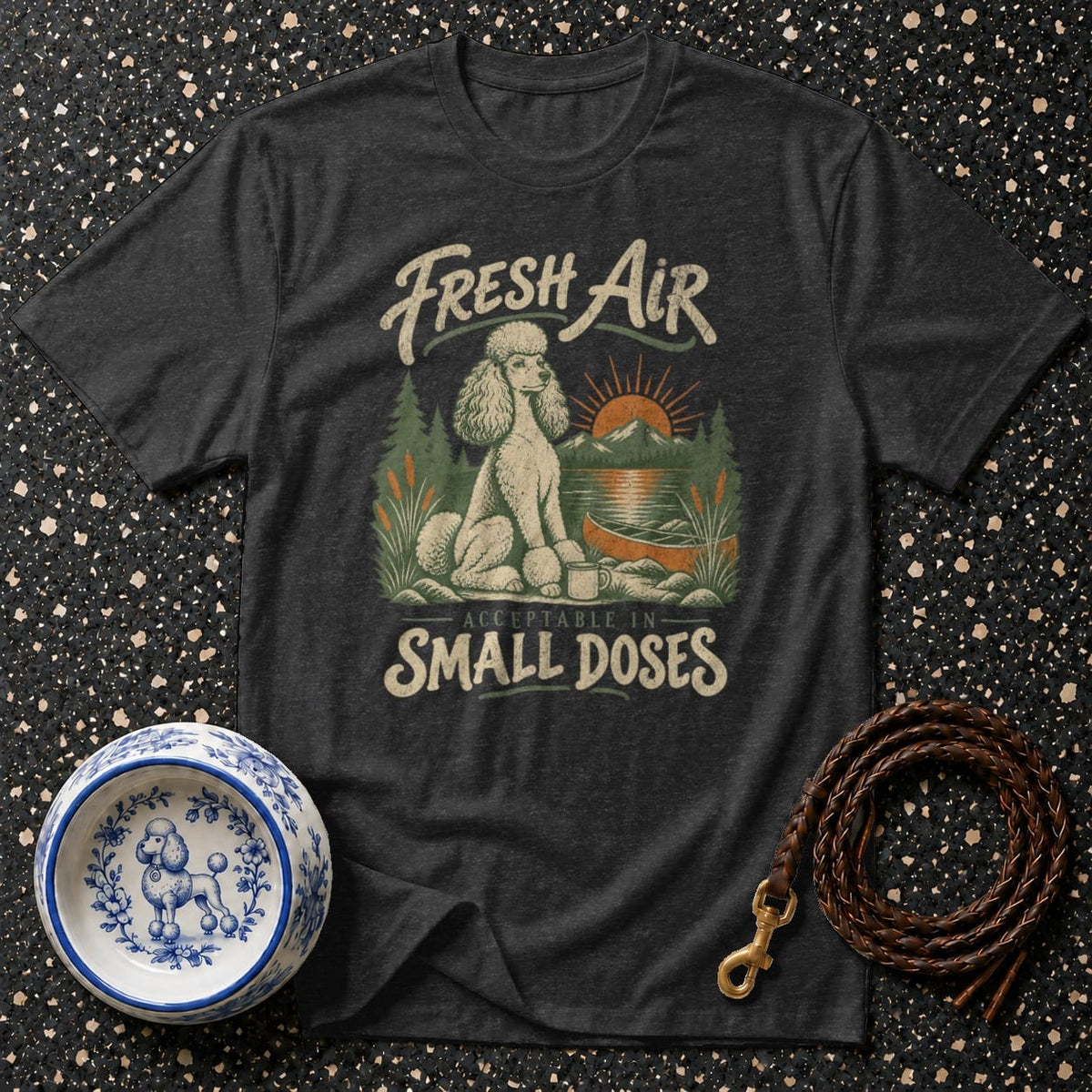 Dark t-shirt with poodle graphic and text: "Fresh Air Acceptable In Small Doses".