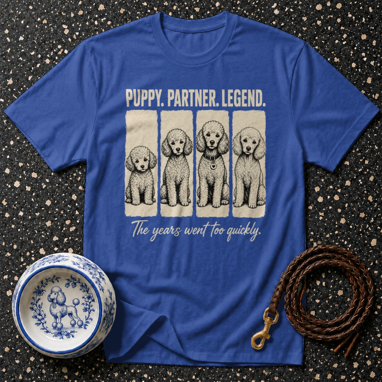 Blue t-shirt with "PUPPY. PARTNER. LEGEND." and four poodles.