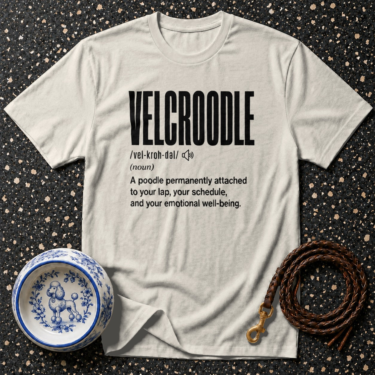 White t-shirt with "VELCROODLE" definition printed in black.