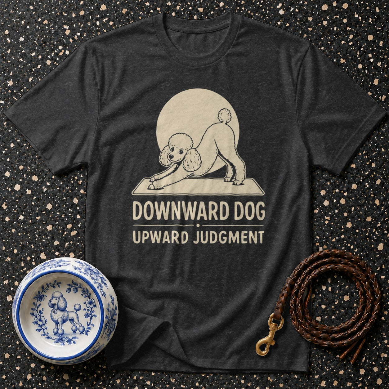 Graphic tee with poodle doing downward dog pose and text "Downward Dog Upward Judgment".
