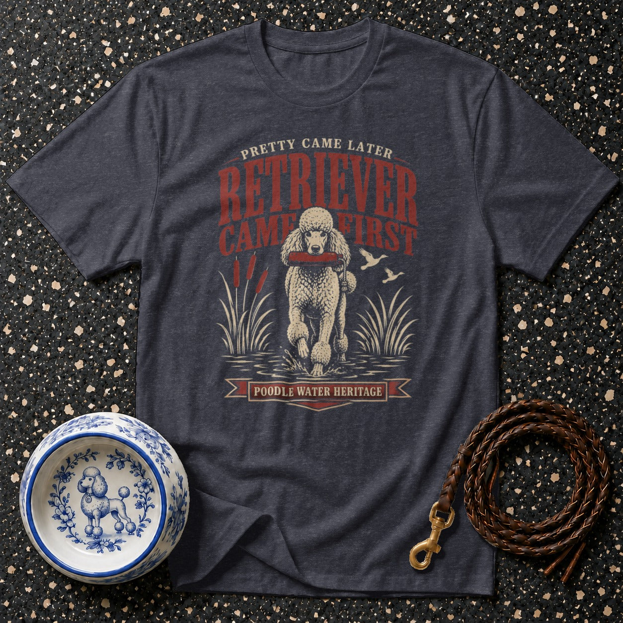 Dark gray t-shirt with vintage poodle water retrieval graphic and text.