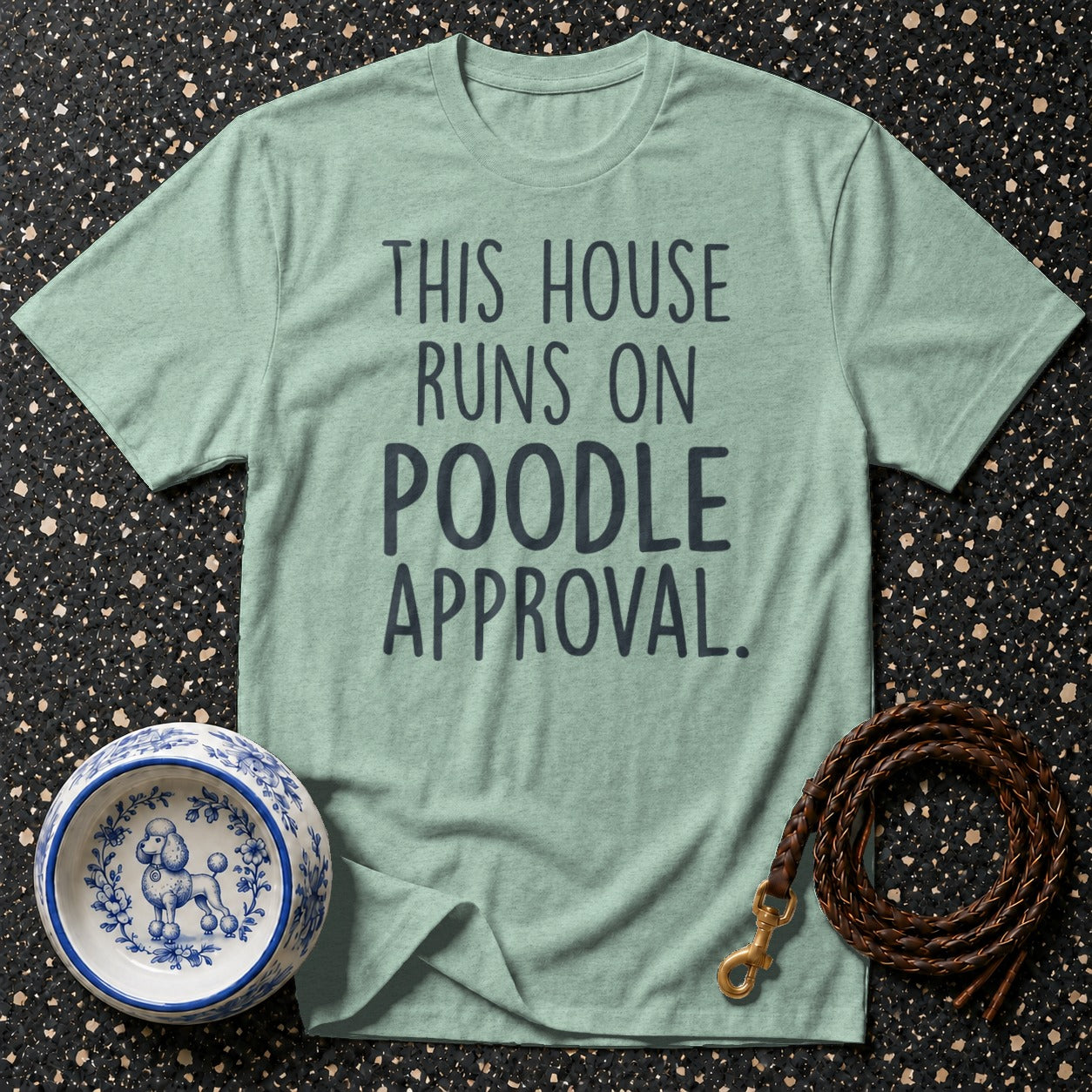 Light green t-shirt with "THIS HOUSE RUNS ON POODLE APPROVAL" text.