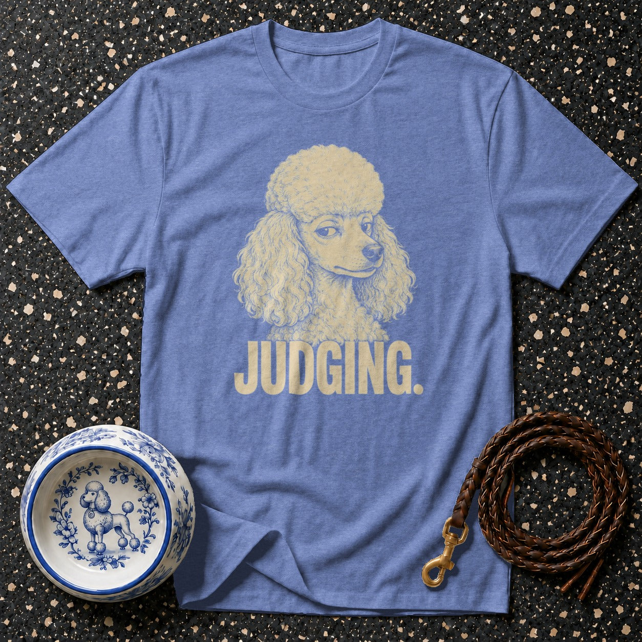 Blue t-shirt with a poodle graphic and the word JUDGING.
