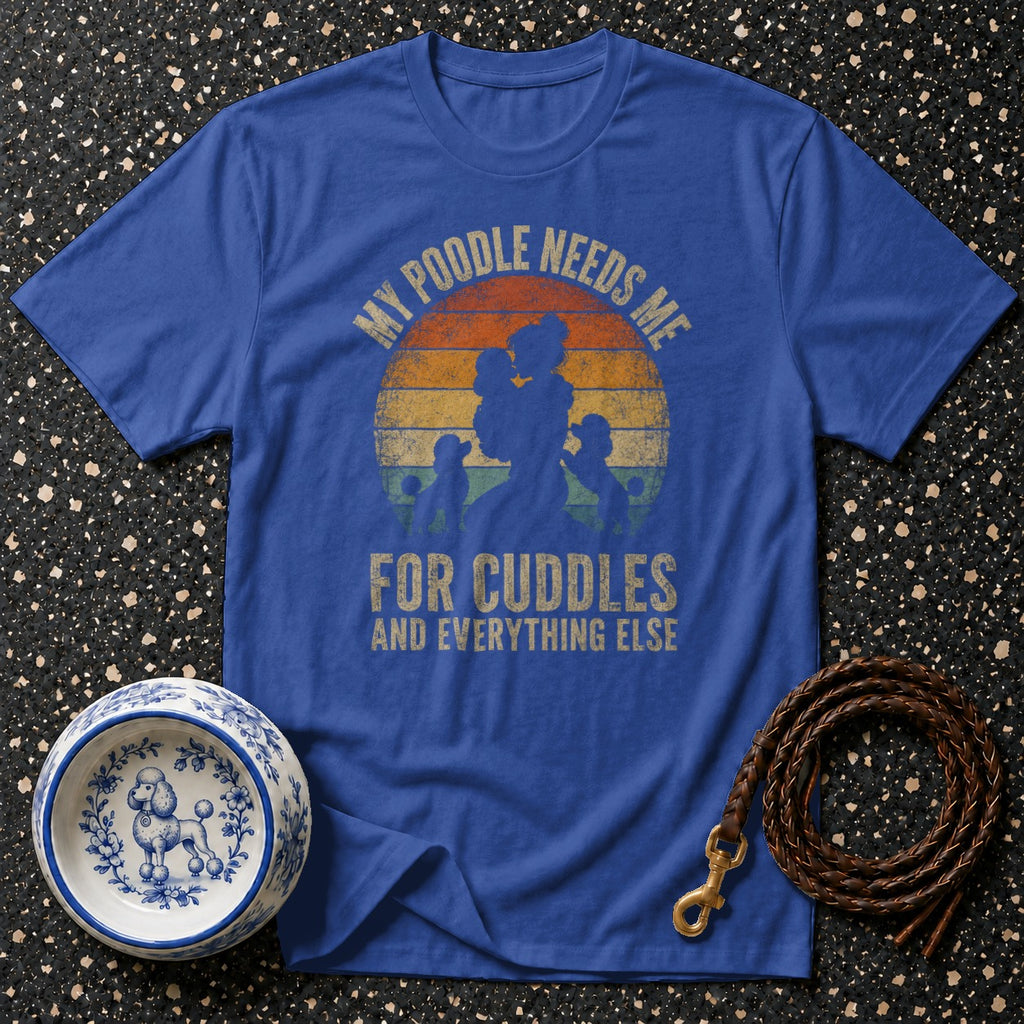 Blue t-shirt with "My Poodle Needs Me For Cuddles And Everything Else" text and poodle silhouette.