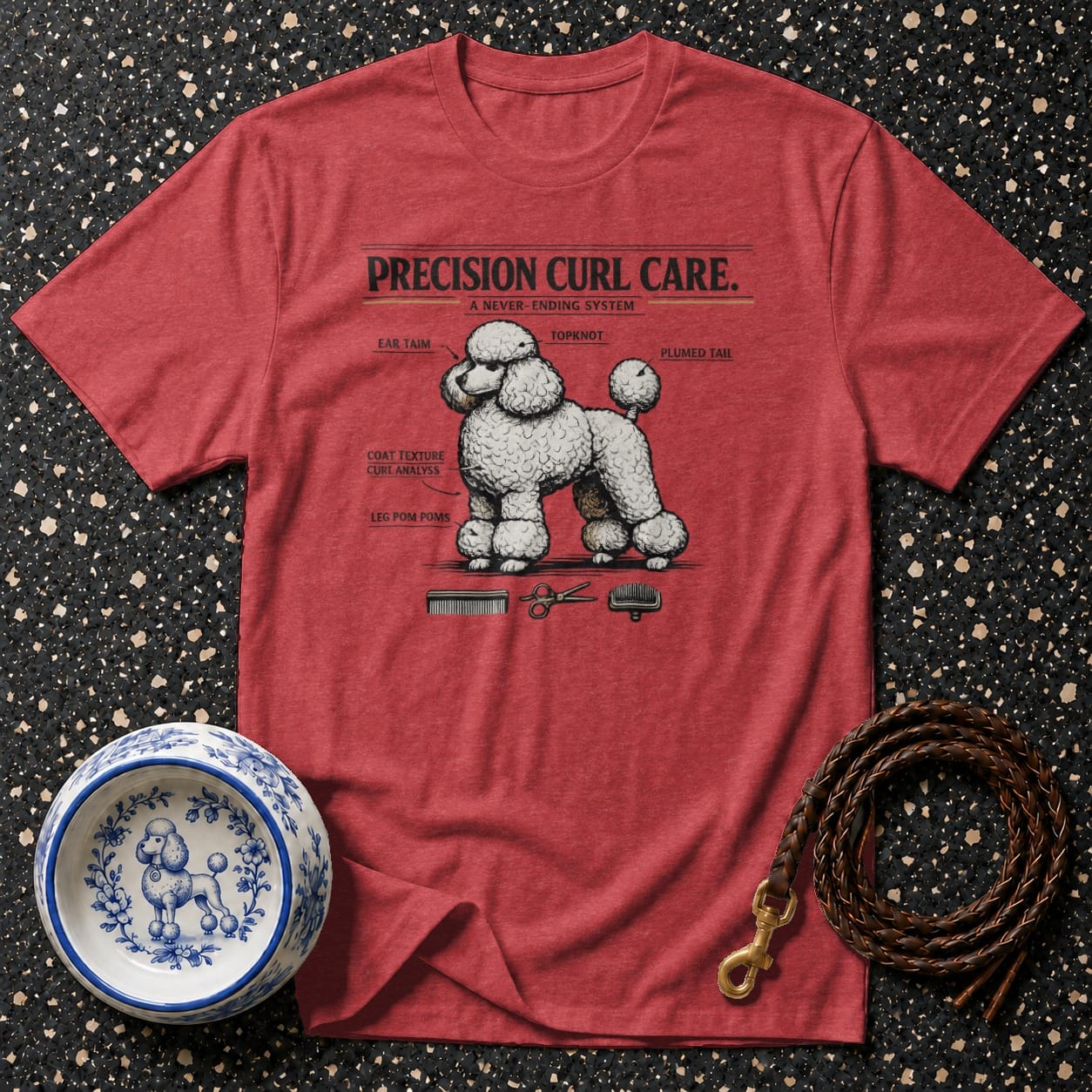 Red t-shirt with diagram of a poodle and grooming tools labeled "Precision Curl Care."