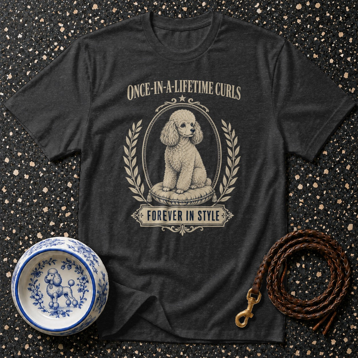 Dark grey t-shirt with a poodle graphic, "Once-in-a-Lifetime Curls, Forever in Style."