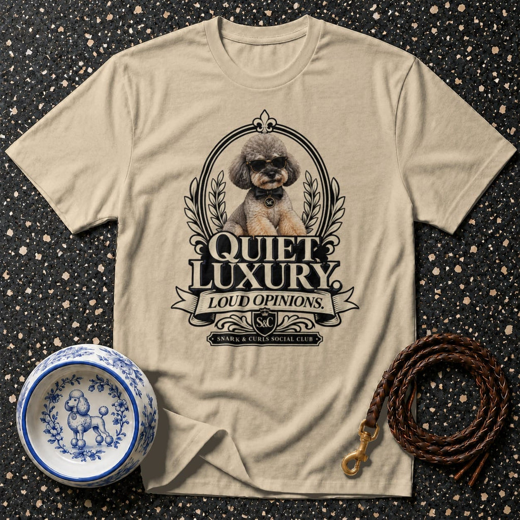 Beige t-shirt with vintage dog graphic and "Quiet Luxury Loud Opinions" text.