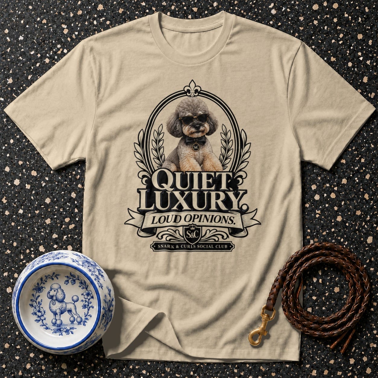 Beige t-shirt with vintage dog graphic and "Quiet Luxury Loud Opinions" text.